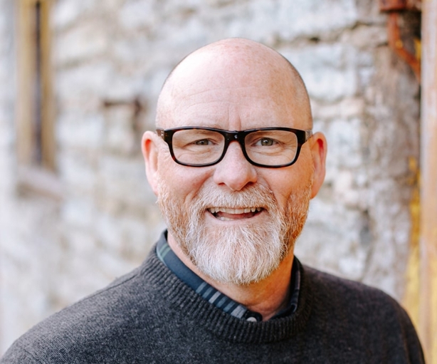 Older man wearing glasses